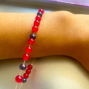 Red and blue glass beads. Unisex. Stretchy.